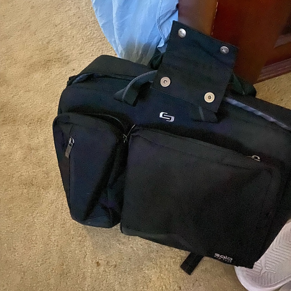 Like new backpack/briefcase. Purchase ase 2 months ago. Still like new